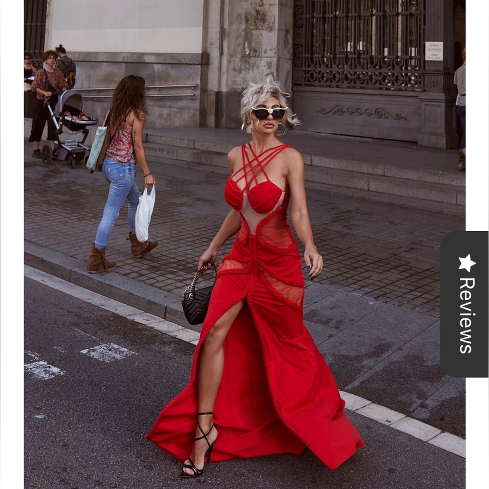 This dress is showstopper. Never wore. Not enough space in my closet.